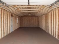 14x36 Peak Style One-Car Garage with a diamond tread plate at the entry way From Pine Creek Structures