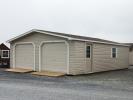 24' x 32' two-car modular garage with vinyl siding and upgraded flooring